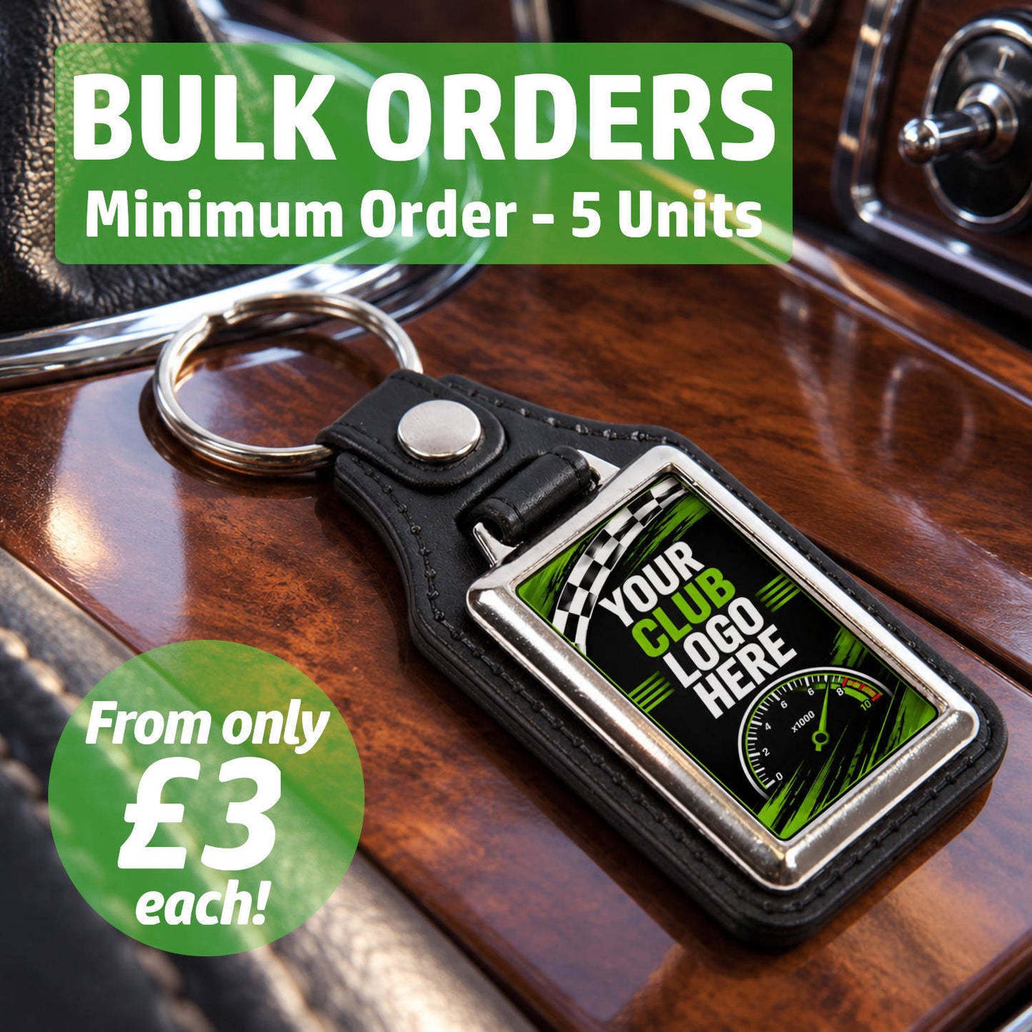 Personalised rectangle leather and metal car club keyring on a classic car centre console featuring text for bulk wholesale orders.