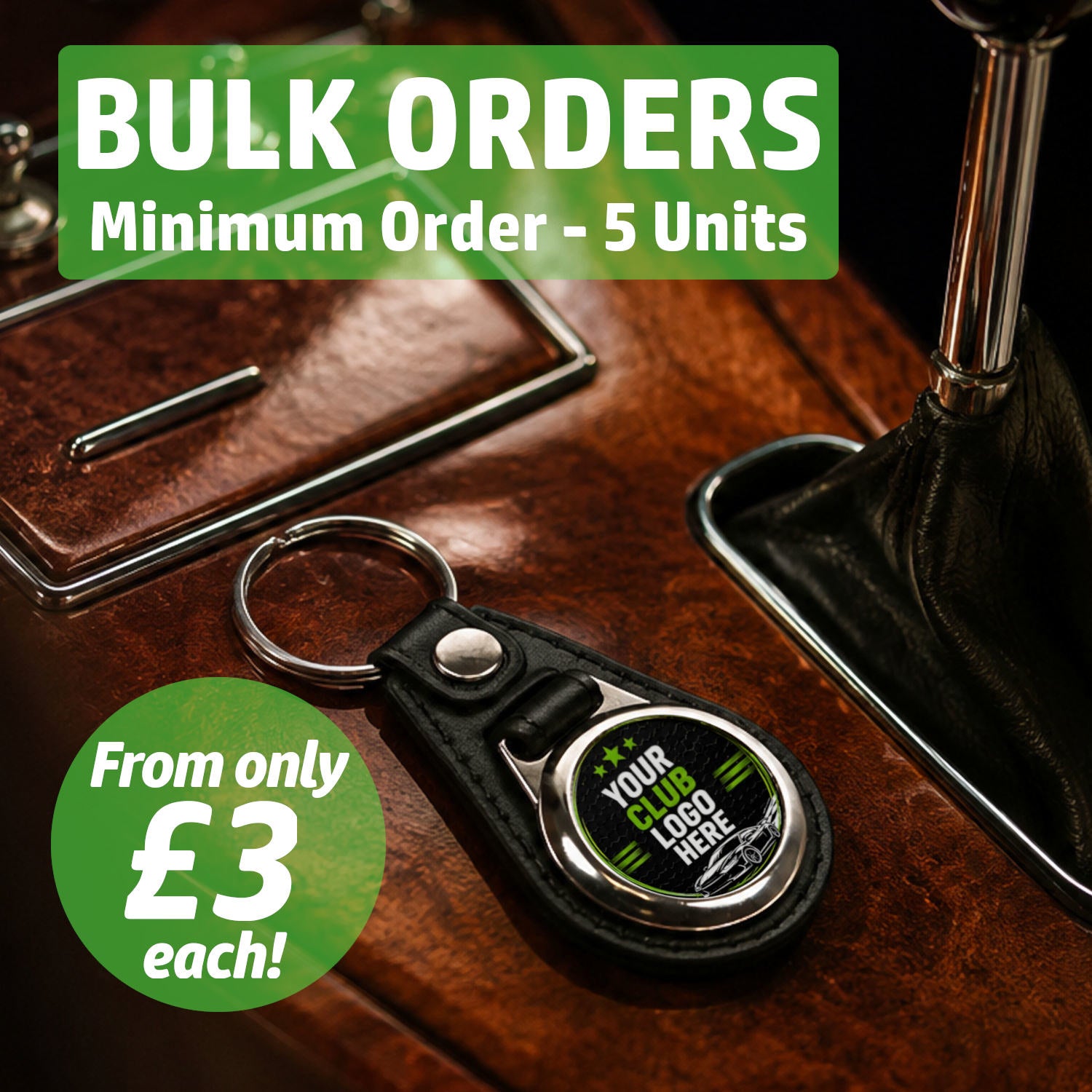 Personalised round rectangle leather and metal car club keyring on a classic car centre console featuring text for bulk wholesale orders.