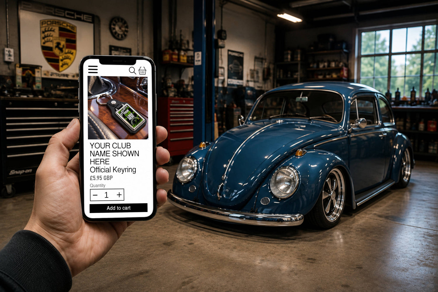 Car Club Keyring mockup demonstation on smartphone being held in garage with cal-look VW Beetle.