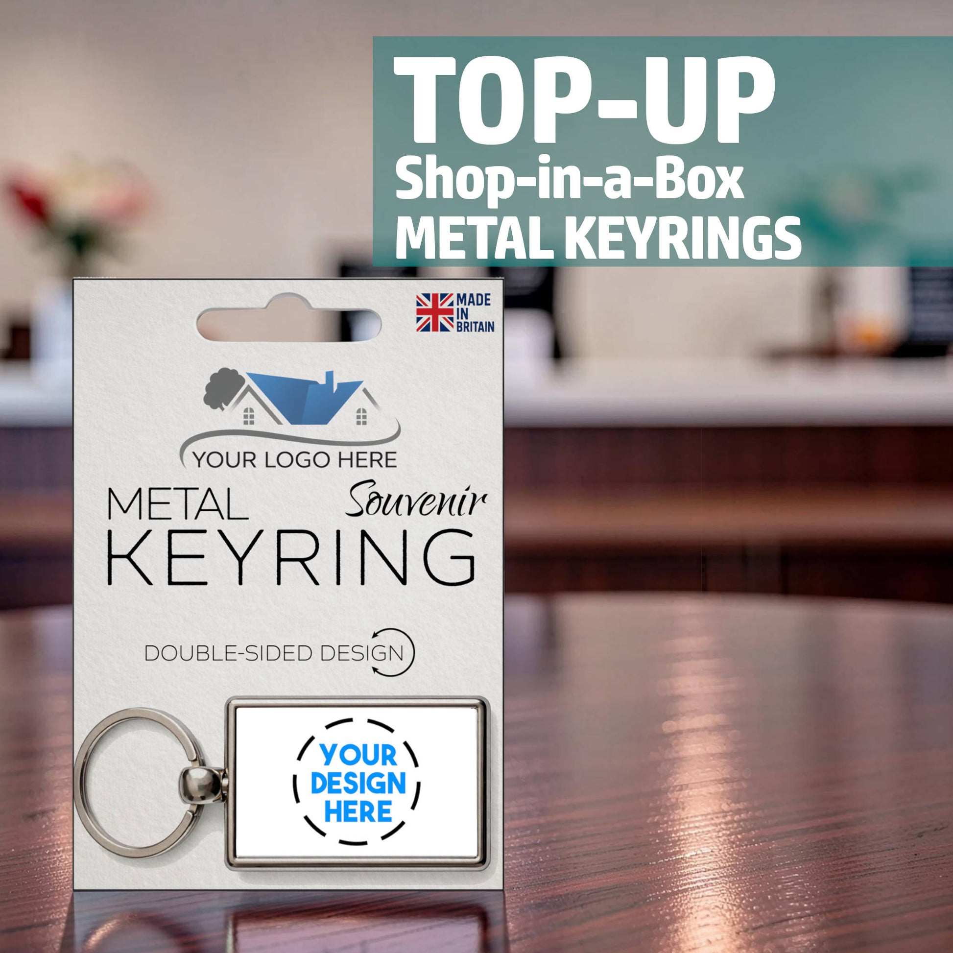 Top-up pack for Snazzy Frog Shop-in-a-Box metal keyrings with your custom logo and design, souvenir packaging shown on display.